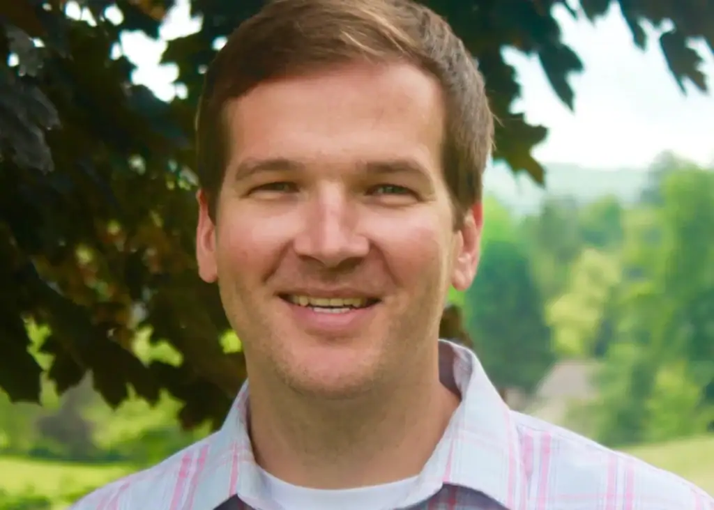 Patrick Brown smiling outdoors at Confluence Behavioral Health.