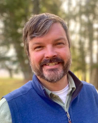 Bill Brown, LCMHC at Confluence Behavioral Health outdoors.