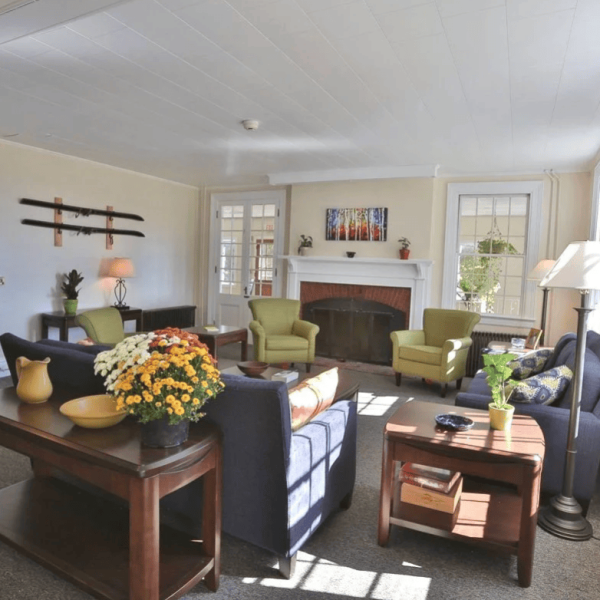 Bright, welcoming space with cozy seating and natural light.